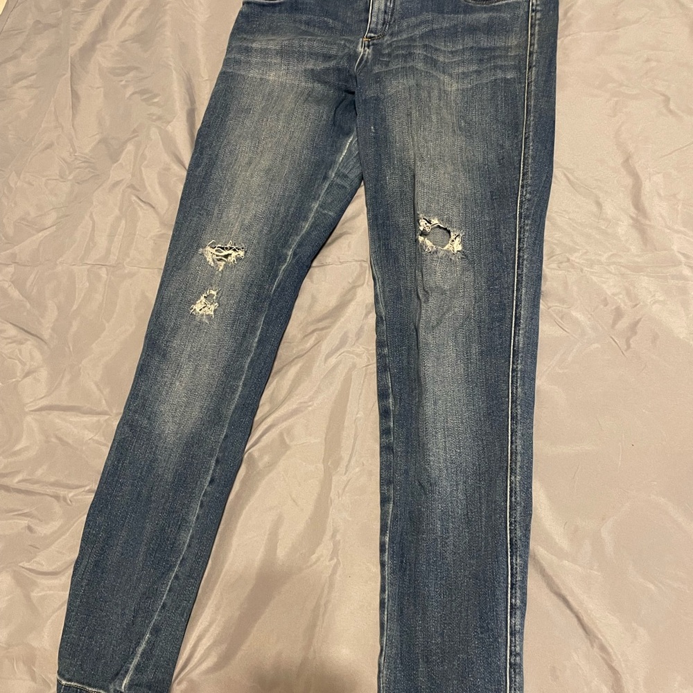Women's Distressed Blue Jeans